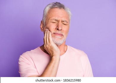 Close-up Portrait Of His He Nice Attractive Sick Grey-haired Man Touching Cheek Jaw Feeling Tooth Pain Caries Isolated Over Bright Vivid Shine Vibrant Lilac Purple Violet Color Background