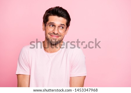 Close-up portrait of his he nice attractive lovely cheerful cheery intelligent shy guy wearing specs don't know what to do isolated over pink pastel background