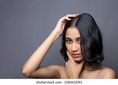 Closeup Portrait Of An Indian Model With Bold Eye Makeup And Lipstick Looking At Camera. Makeup Portrait For Eye Makeup And Lipstick.