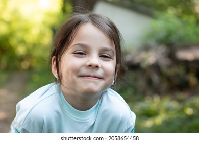 Close-up portrait of little beautiful biracial girl on blurred rustic background with lovely bokeh - Powered by Shutterstock