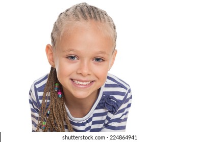 Closeup portrait of a little girl on a white background. Girl six years. - Powered by Shutterstock