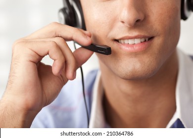 Closeup portrait of man with a headset. Selective focus.