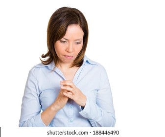 Closeup Portrait, Mature Woman, Shy, Sad, Playing Nervously With Hands Looking Down, Feeling Guilty, Sorry For Actions, Faults Did Wrong, Isolated White Background. Expression, Emotion, Reaction