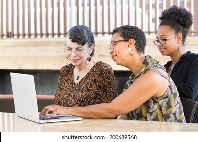 Closeup Portrait, Multigenerational Family Looking At Something Exciting On Laptop, Isolated Outdoors Background