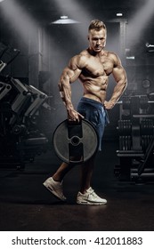 Closeup portrait of a muscular man workout 