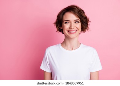 Close-up portrait of nice attractive glad cheerful brown-haired girl copy space place isolated over pink pastel color background