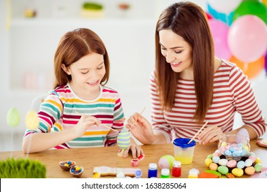 Close-up portrait of nice attractive lovely winsome cheerful cheery girls small little daughter creating handicraft handiwork in white light interior room house indoors - Powered by Shutterstock