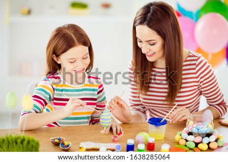 Close-up portrait of nice attractive lovely winsome cheerful cheery girls small little daughter creating handicraft handiwork in white light interior room house indoors