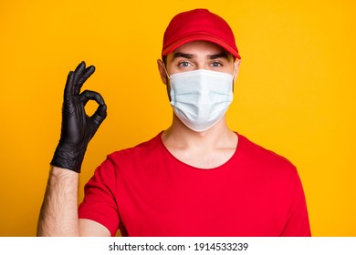 Close-up Portrait Of Nice Mailman Wearing Mask Showing Ok-sign Mers Cov Infection Prevention Stop Pandemia Isolated On Bright Yellow Color Background