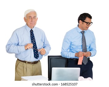 Closeup Portrait Of Old Elderly Business Man Ceo Boss Giving Pink Slip Fired To Sad Depressed Young Employee Who Walks Away In Shame, Isolated On White Background. Conflict In The Office Work Place.