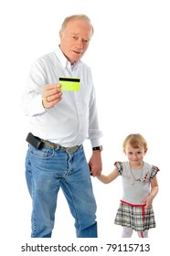 Closeup Portrait Of Old Man And His Daughter. They Are Walking Together Hand In Hand. He Is Holding Credit Card And Wants To Buy A Gift To His Child