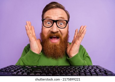 Close-up portrait of overjoyed funky it-specialist found a solution to problem isolated on purple color background - Shutterstock ID 2175899221