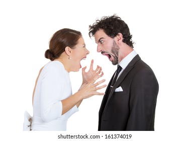 Closeup portrait of people, man and woman, couple screaming at each other, blaming each other for problem, isolated on white background. Marriage difficulties concept, negative emotions, expressions