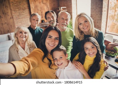 Closeup portrait photo of full big family gathering eight people make selfie cuddle embrace wait pray thank god have good autumn time make wish generation in home evening living room indoors - Shutterstock ID 1808614915