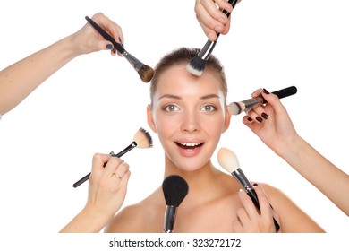 Closeup portrait picture of beautiful woman with brushes - Shutterstock ID 323272172