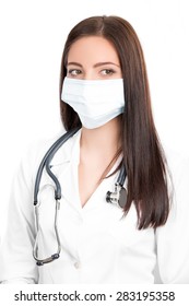  A Close-up Portrait Of A Pretty Female Doctor Or Nurse With Stethoscope Wearing A Surgical Mask  Isolated On A White Background