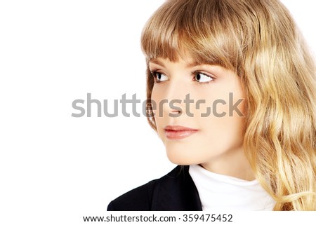 Close-up portrait of a pretty teenager girl smiling at camera. Beauty, fashion. Education. Isolated over white.