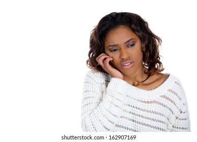 Closeup Portrait Of Pretty Young Woman With Tooth Ache Problem About To Cry From Pain Touching Outside Mouth With Hand, Isolated White Background Copy Space To Left. Negative Emotion Facial Expression