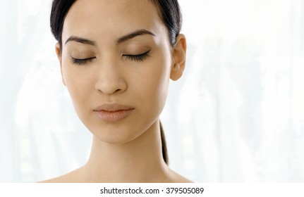 Closeup portrait of relaxing woman's face eyes closed. - Powered by Shutterstock