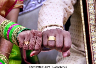 A Closeup Portrait Of Right Hands Of A Hindu Couple After Exchanging Rings In The Engagement Ceremony Near Bangalore Or Bengaluru, Karnataka, India. The Couple Is In Hindu Traditional Attire.