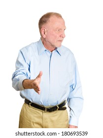 Closeup Portrait Of Sarcastic, Senior Mature Man With Bad Attitude Forced To Extend Arm For Handshake, Not Happy About It, Isolated On White Background. Negative Emotions, Facial Expression, Feelings 