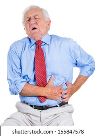 Closeup Portrait Of Senior Executive, Old Man, Elderly Corporate Employee, Grandfather Looking Miserable, Very Sick, Doubling Over In Stomach, Spleen Pain, Isolated On White Background. Heart Attack.