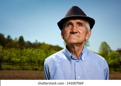 Closeup Portrait Of A Senior Farmer Outdoor