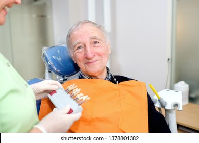 Closeup Portrait Of Senior Male 70 Years Old In Dental Office Sitting In Dentist Chair. Dental Care For Older People. Dentistry, Medicine And Health Care Concept