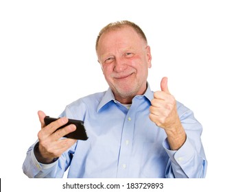 Closeup Portrait, Senior Man, Looking Happy, Excited At Something On A Cell Phone, Watching Sports Game Match Or Reading An Sms, E-mail, Viewing Latest News, Isolated White Background.