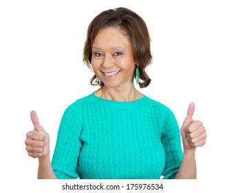 Closeup portrait of senior mature happy, smiling excited natural woman giving thumbs up sign with fingers, isolated on white background. Positive emotion facial expressions symbols, feelings attitude