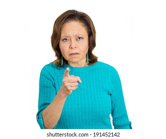 Closeup Portrait Serious, Skeptical, Mad Angry Pissed Off Woman Pointing Index Finger At You Placing Blame, Accusation, Isolated White Background. Negative Emotion, Facial Expression, Feeling Reaction