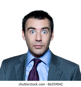 Closeup Portrait Of A Shocked Handsome Mature Man With Wide Open Eyes In Studio On Isolated White Background