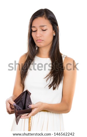 Closeup portrait of shocked, upset, sad, unhappy young woman standing showing empty brown wallet, isolated against white background. Financial difficulties, bad economy concept. Negative emotion
