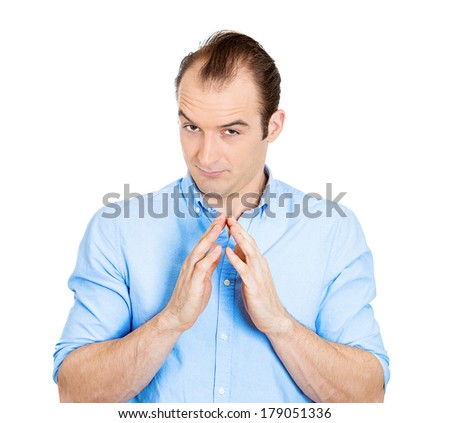 Closeup portrait of sneaky, sly, scheming young man, boy, worker trying to plot something, screw someone, isolated on white background. Negative human emotions, facial expressions, feelings, attitude