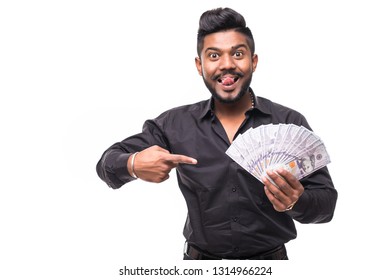 Closeup Portrait Of Super Happy Excited Successful Young Man Holding Money Dollar Bills In Hand, Isolated On White Background.