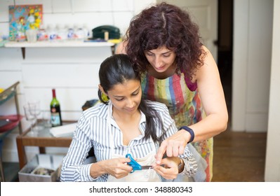 Closeup Portrait, Teacher Showing How To Create Fine Arts And Craft On Mixed Media Canvas, Isolated Indoors Art Studio Background