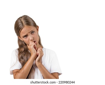 Closeup portrait teenager girl with finger in mouth, sucking thumb, biting fingernail in stress, clueless, isolated on white background. Negative emotion facial expression feeling. Body language
