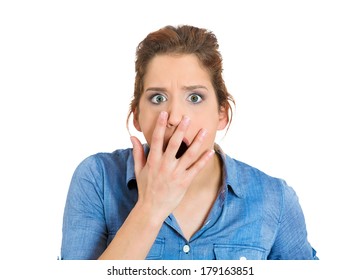 Closeup portrait of terrified, young business woman looking shocked, surprised in full disbelief, hand on mouth, isolated on white background. Negative emotions, facial expressions, feelings, reaction