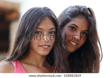 Similar – Happy women looking at camera over garden fence