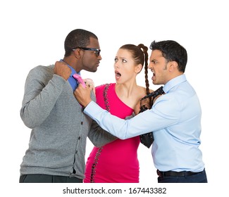 Closeup Portrait Of Two Men Fighting Over A Woman Caught In Middle, Isolated On White Background.  Relationship And Society Conflict, Problems, Issues. Negative Emotion Facial Expression Feelings.