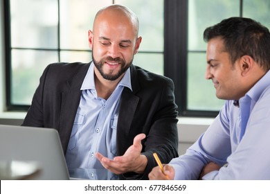 Closeup Portrait Of Two People Having Business Discussion On Laptop, Isolated Indoors Office Window Background