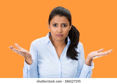 Closeup Portrait, Unhappy, Young, Pretty Business Woman, Manager, Student, Worker Asking Whats The Problem, Who Cares, So What, I Dont Know. Isolated Orange Background. Negative Emotions