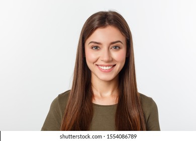 Close-up portrait of yong woman casual portrait in positive view, big smile, beautiful model posing in studio over white background. Caucasian Asian portrait woman.