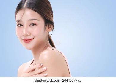 Close-up portrait of young Asian beautiful woman with K-beauty make up style and healthy and perfect skin isolated on light blue background for skincare commercial product advertising. - Powered by Shutterstock