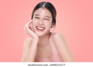 Close-up portrait of young Asian beautiful woman with K-beauty make up style and healthy and perfect skin isolated on pink background for skincare commercial product advertising. - Powered by Shutterstock