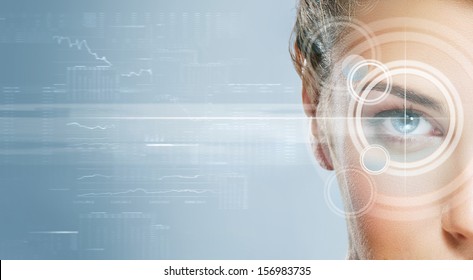 Close-up portrait of young and beautiful woman with the virtual hologram on her eyes (laser medicine and security technology concept) - Powered by Shutterstock