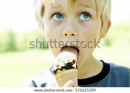 Similar – Image, Stock Photo Lovely boy eating an ice cream on the beach