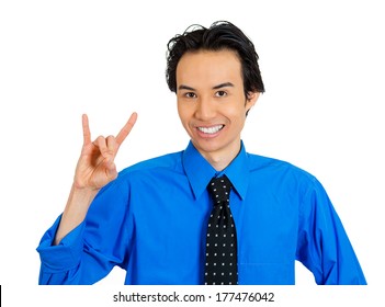 Closeup Portrait Of Young Cool Man Showing A Hook 'em Horns Or Rock On Sign Gesture Symbol, Isolated On White Background. Positive Emotion Facial Expression Feelings, Body Language