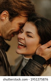 Close-up Portrait  Of Young Laughing Caucasian Couple Isolated In Natural Background. Dating Outdoors. Engagement Offer Mood Genuine Natural Sparkling Joy Laugh Fun Faces Together Forehead  