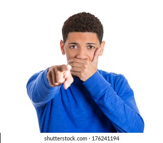 Closeup portrait of young man closed mouth looking shocked, surprised in full disbelief pointing at you camera gesture, isolated on white background. Negative human emotions facial expression feelings